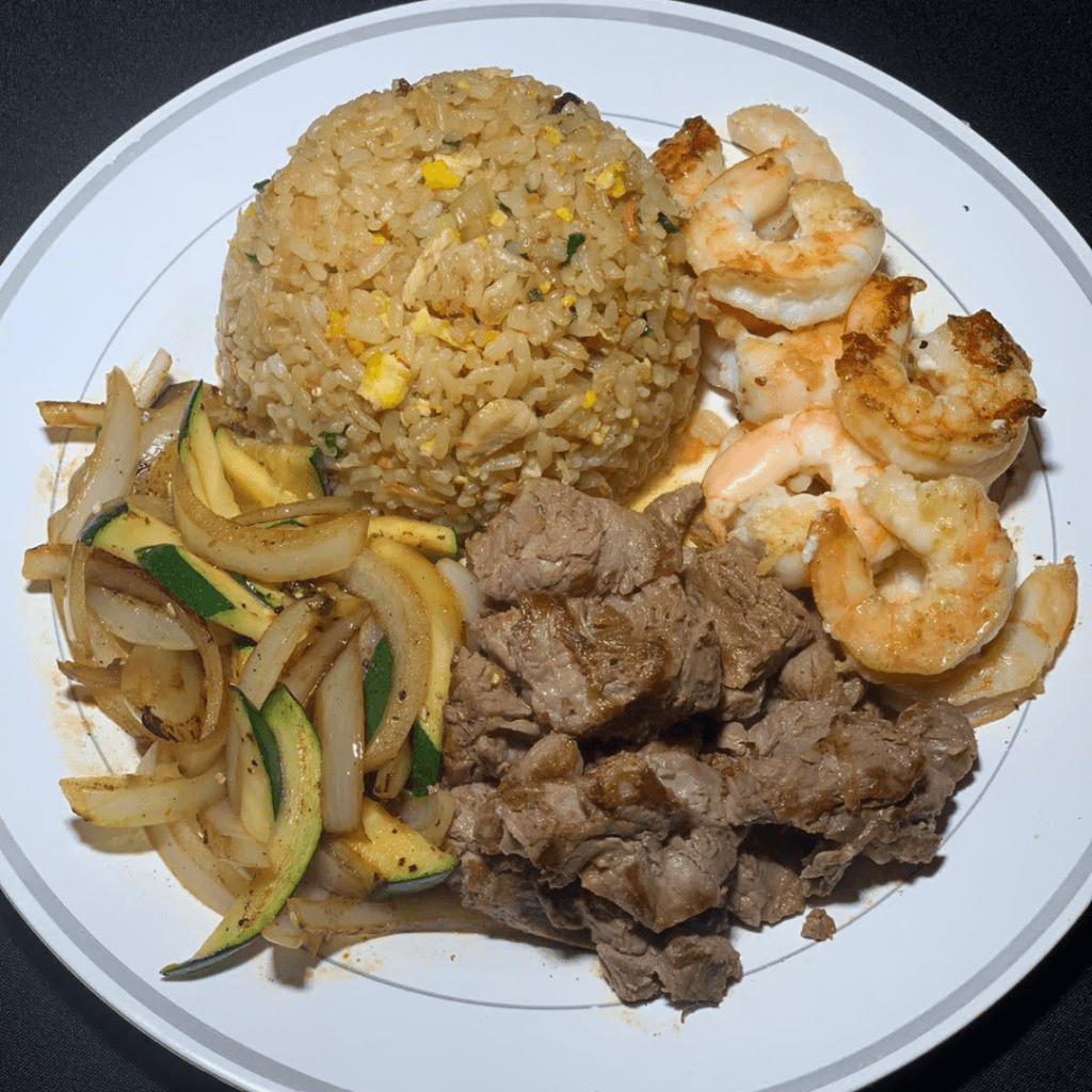 Hibachi style filet mignon and shrimp with fried rice